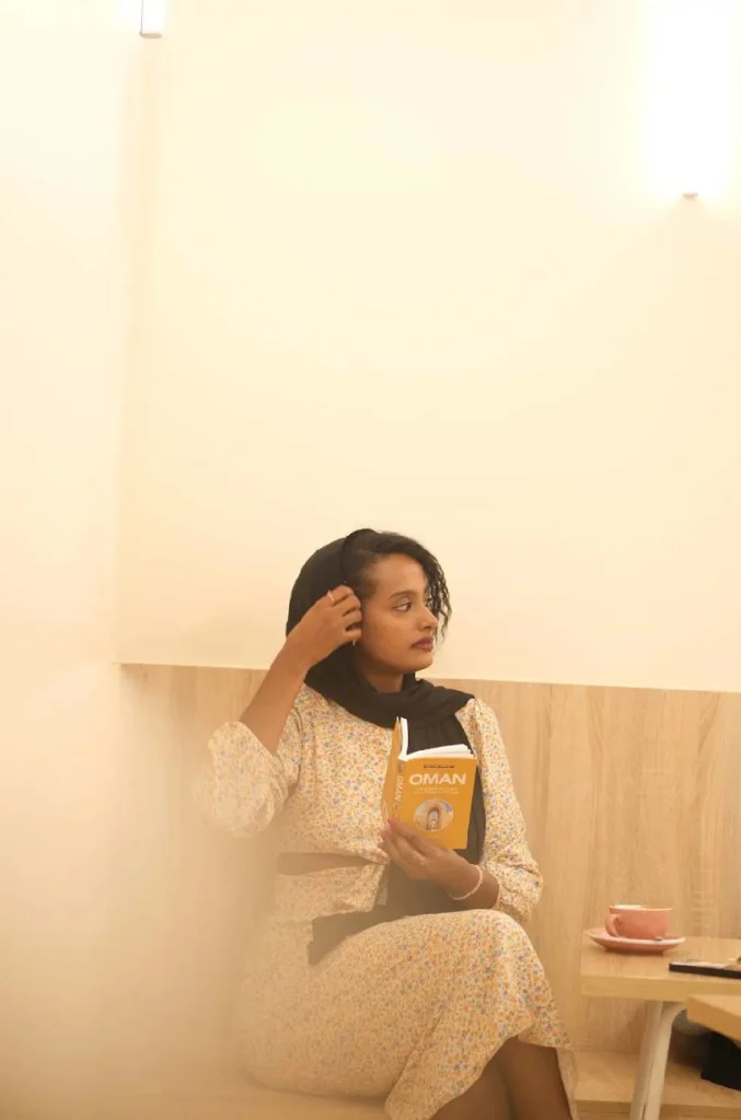 Feven Mehereteab sitting